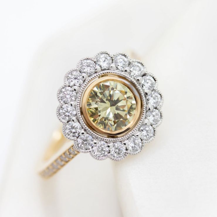 Yellow diamond flower engagement ring